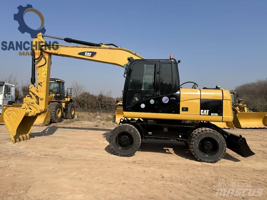 CAT M 320 D2 Bageri točkaši