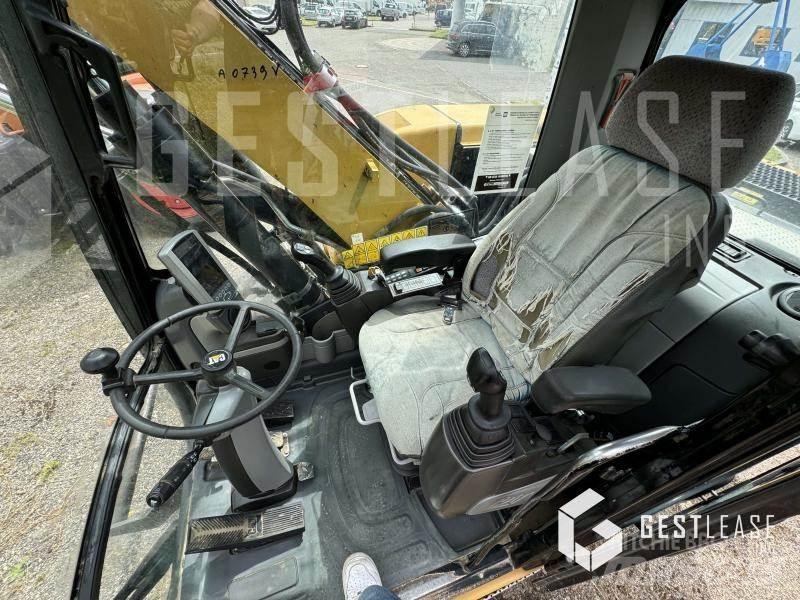 CAT M313D Bageri točkaši