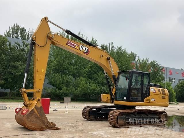 CAT 323GX Bageri guseničari