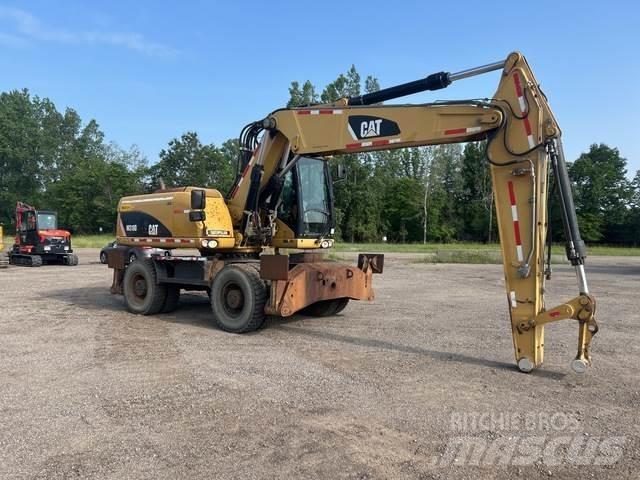 CAT M318D Bageri točkaši