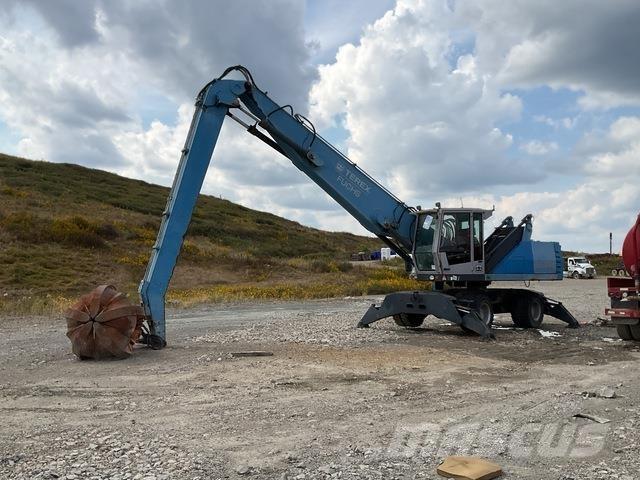 Fuchs MHL340 Bageri za prenos primarnih/sekundarnih sirovina