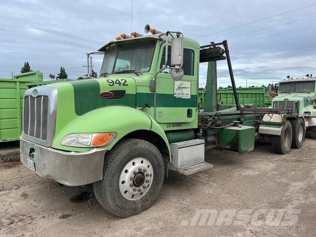Peterbilt 330 Rol kiper kamioni sa kukom za podizanje tereta