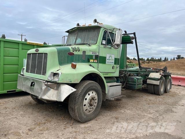 Peterbilt 330 Rol kiper kamioni sa kukom za podizanje tereta