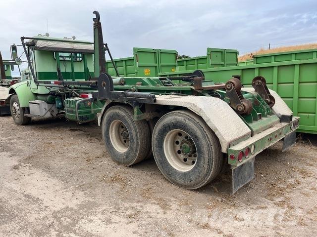 Peterbilt 330 Rol kiper kamioni sa kukom za podizanje tereta