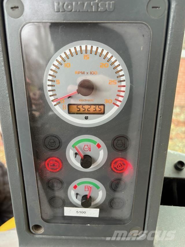 Komatsu WB97 Rovokopači