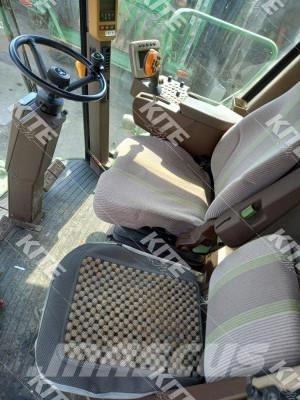 John Deere C670 Kombajni