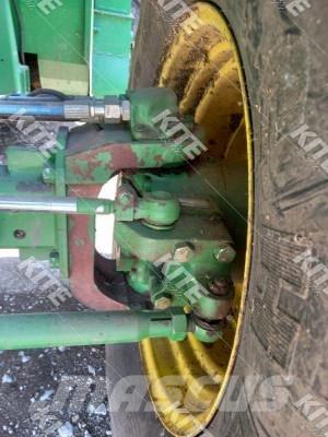 John Deere C670 Kombajni