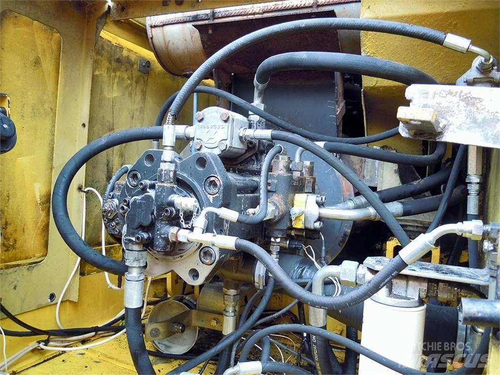 New Holland E305 Bageri guseničari