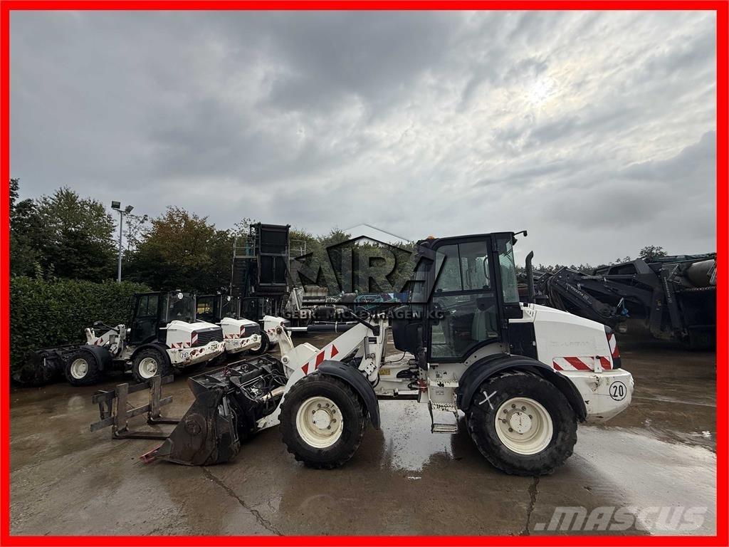 CAT 908M Utovarivači na točkove