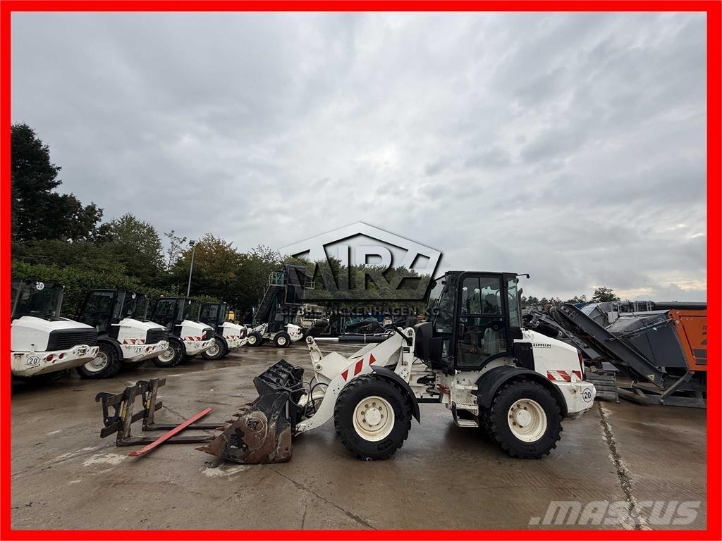 CAT 908M Utovarivači na točkove