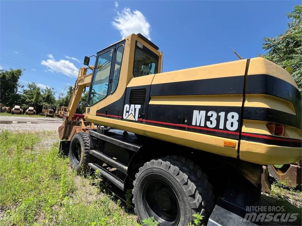 CAT M318 Bageri točkaši