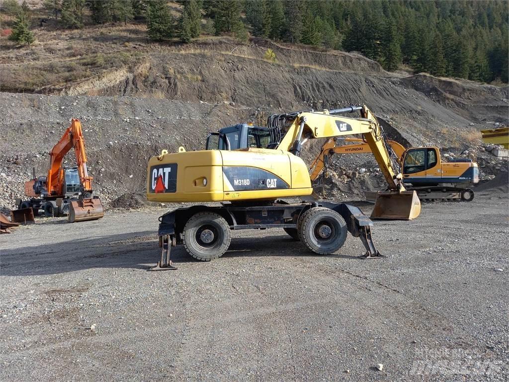 CAT M318D Bageri guseničari