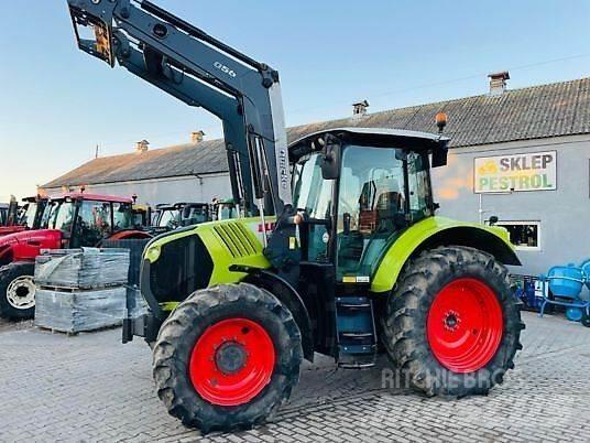 CLAAS ARION 520 Traktori