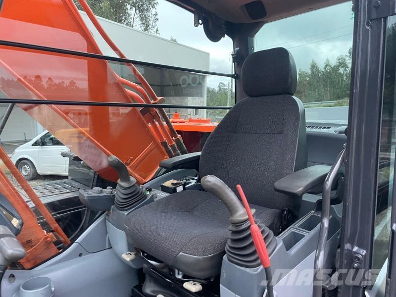 Hitachi ZX210 Bageri guseničari