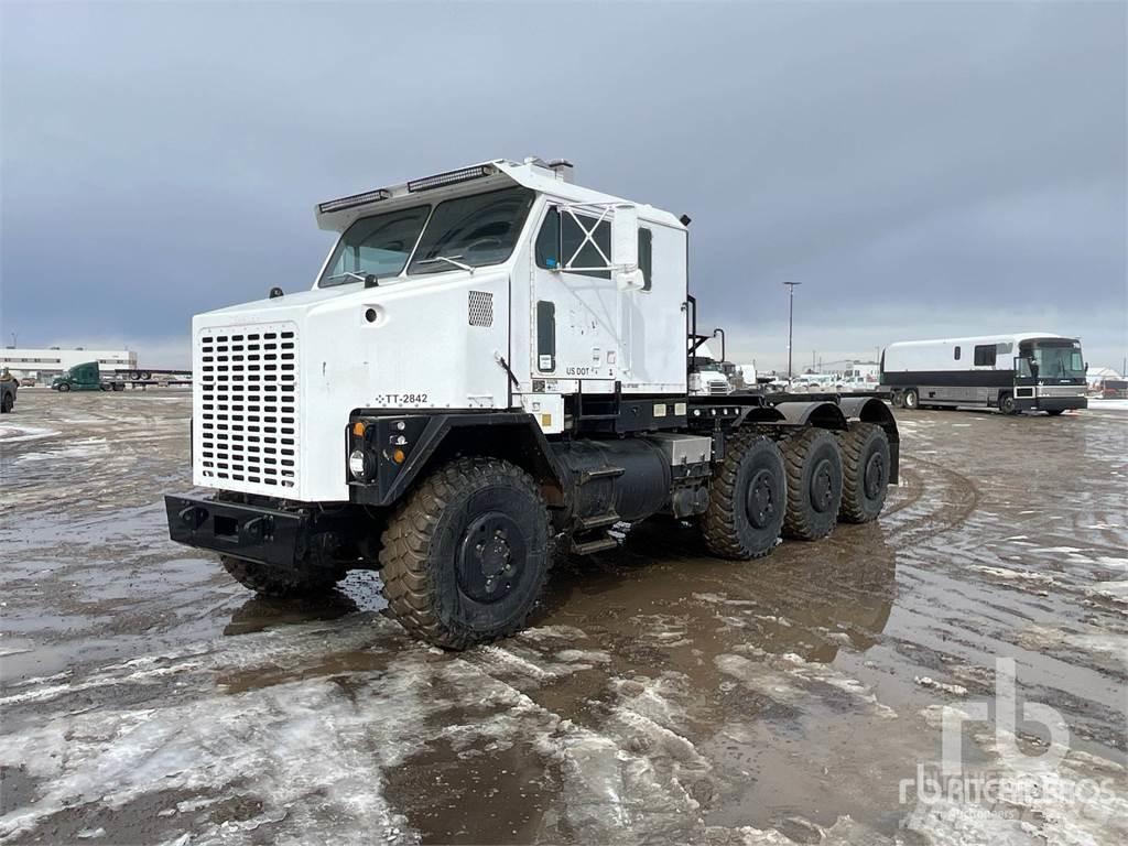 Oshkosh M1070 Kamioni sa ravan platformom / vitlom